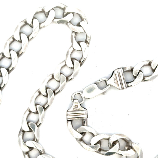 Silver curb chain weighing 80.2g, featuring interlocking links, ideal for jewelry making or accessorizing.