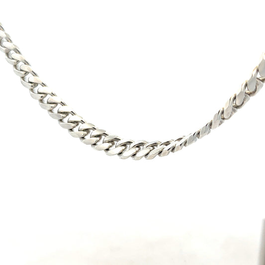 Silver curb chain weighing 81.2g, showcasing a sleek, polished design with interlocking links, ideal for jewelry or accessories.