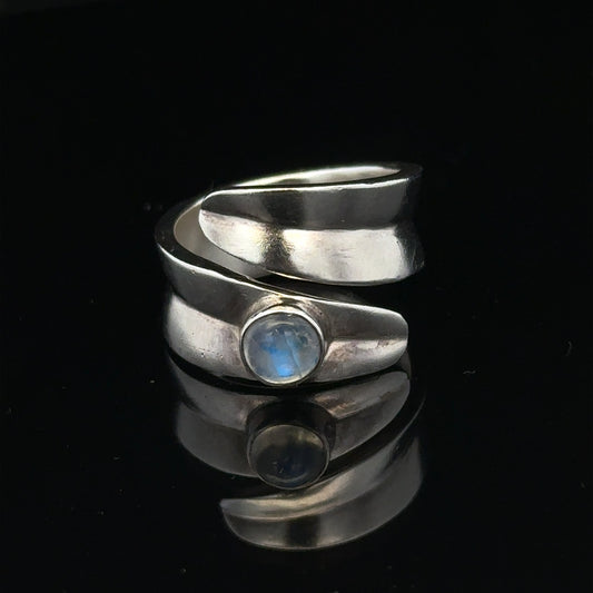 Silver ring size R with a smooth band, unbranded jewelry piece featuring a sleek, minimalist design.