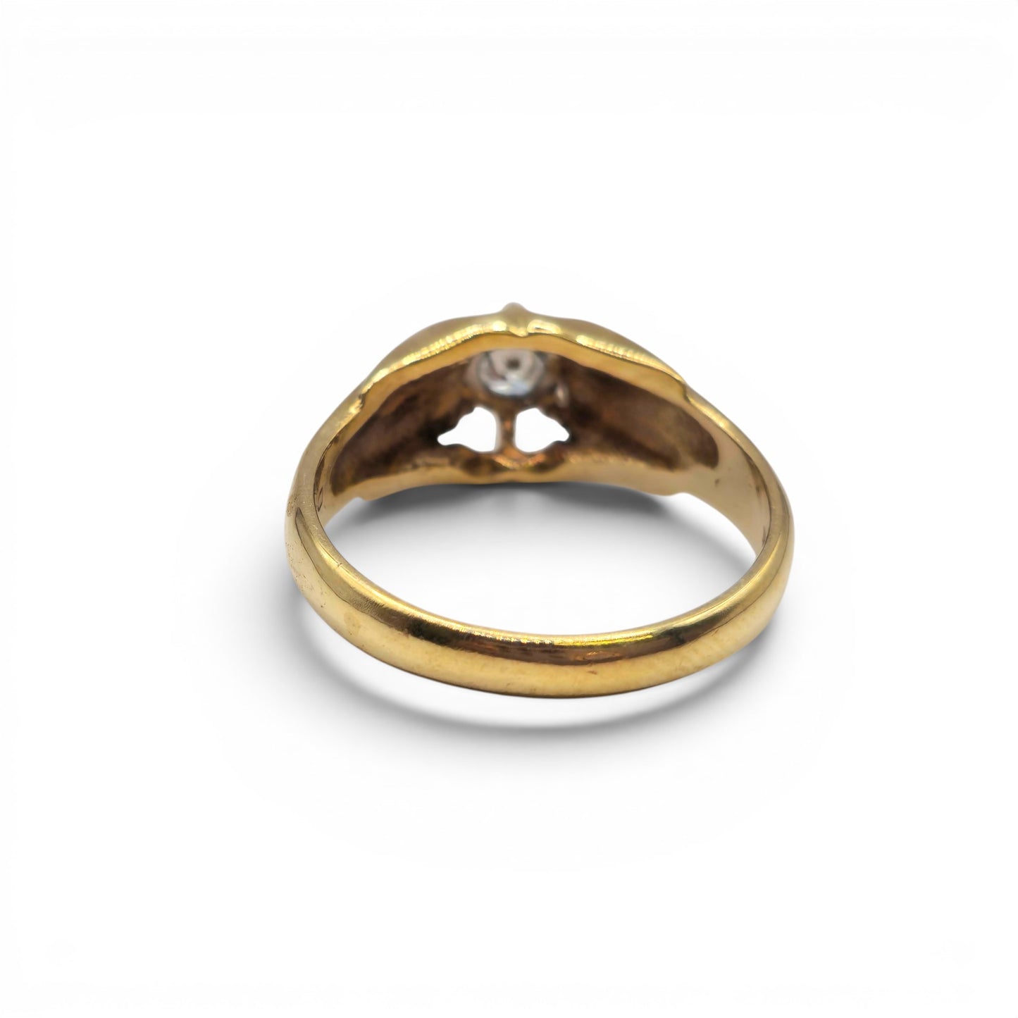 9ct yellow gold diamond ring by Reeves and Sons with sparkling diamonds and a polished band, displayed on a white background.