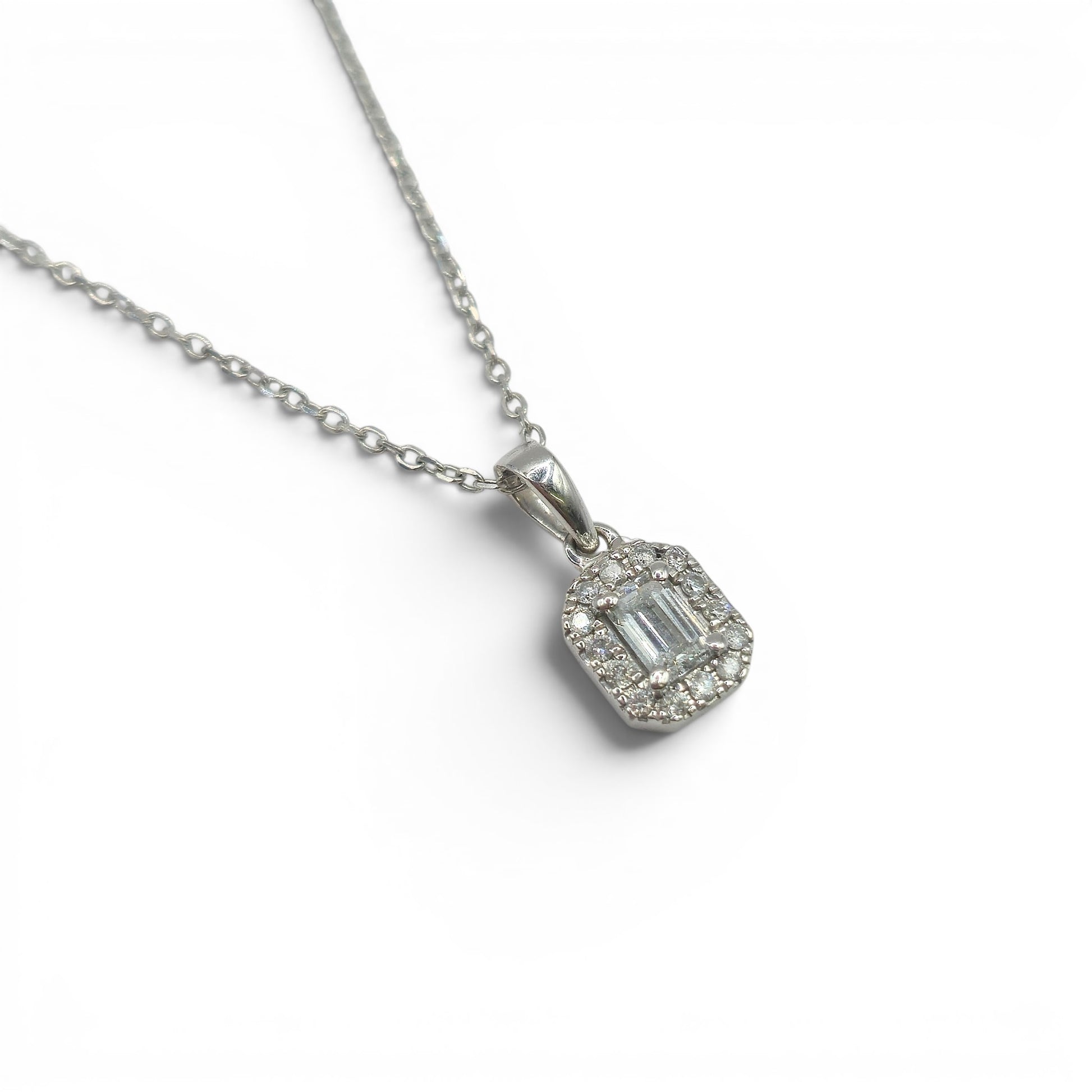 Reeves and Sons 18ct white gold diamond cluster pendant chain, showcasing a sparkling diamond cluster design on a fine chain