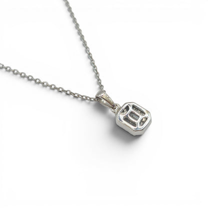 Reeves and Sons 18ct white gold diamond cluster pendant on chain, showcasing sparkling diamonds and elegant jewelry design.