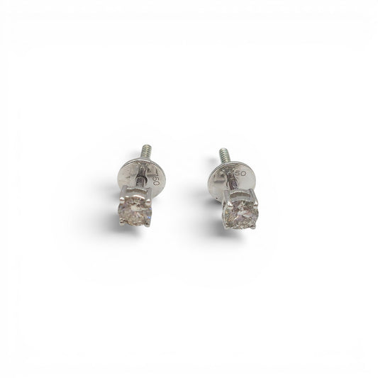 18ct white gold diamond stud earrings by Reeves and Sons, featuring sparkling diamonds set in a classic design.