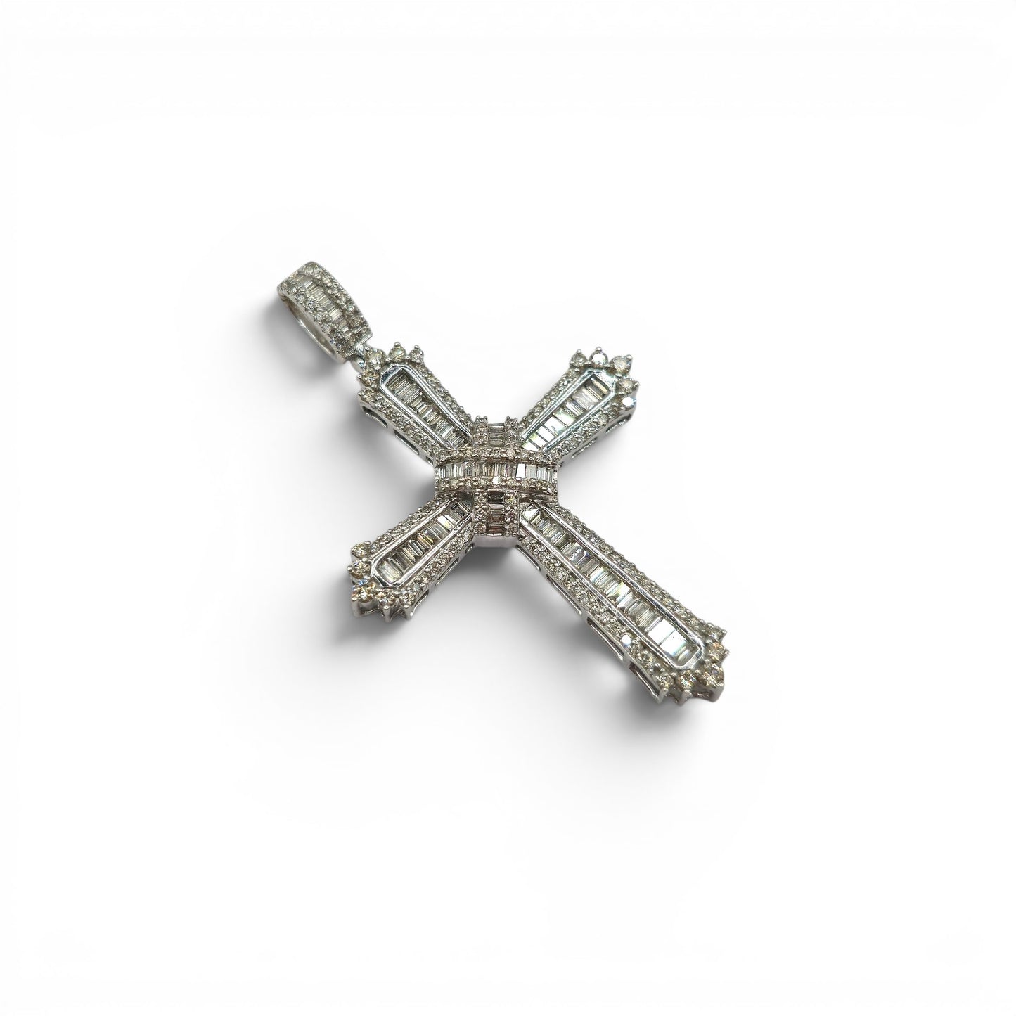 9ct white gold diamond cross pendant by Reeves and Sons, featuring sparkling diamonds on a delicate chain.