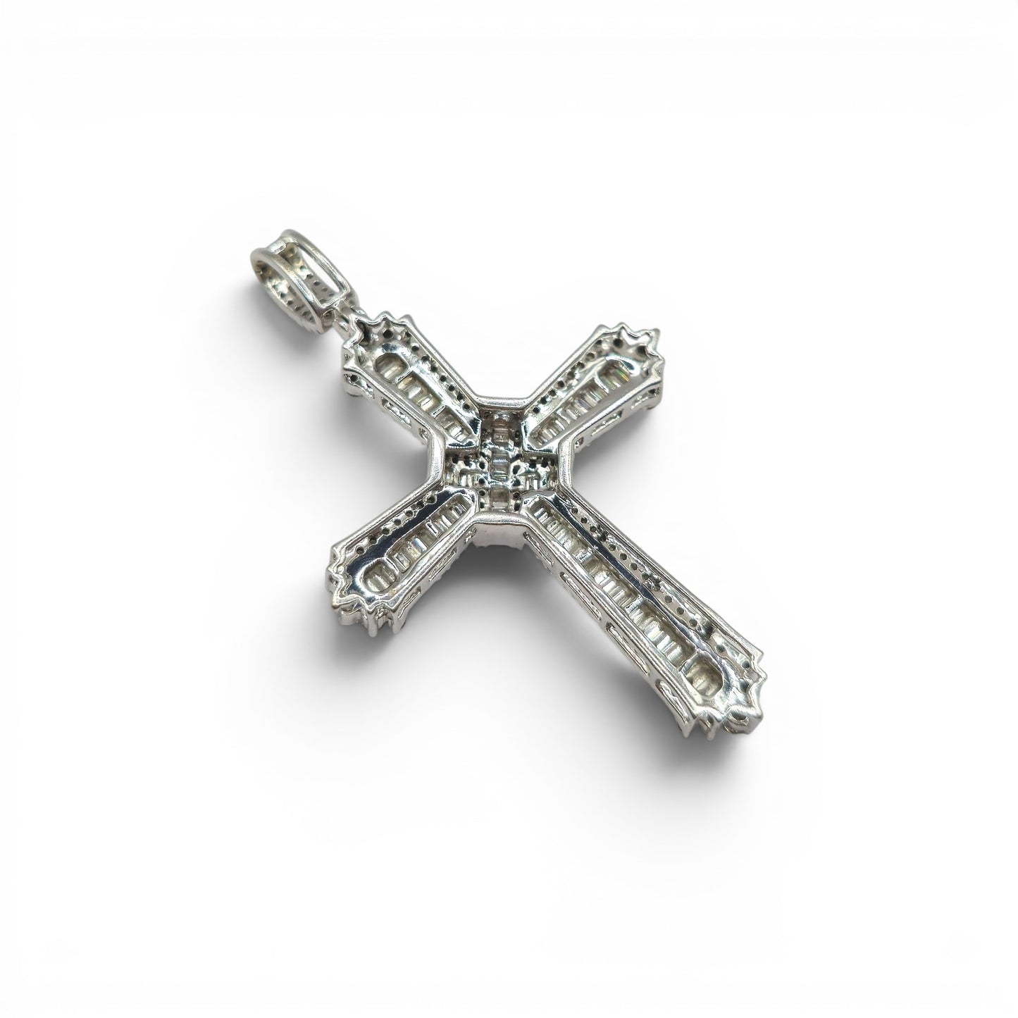 9ct white gold diamond cross pendant by Reeves and Sons, featuring a detailed cross design with sparkling diamonds.