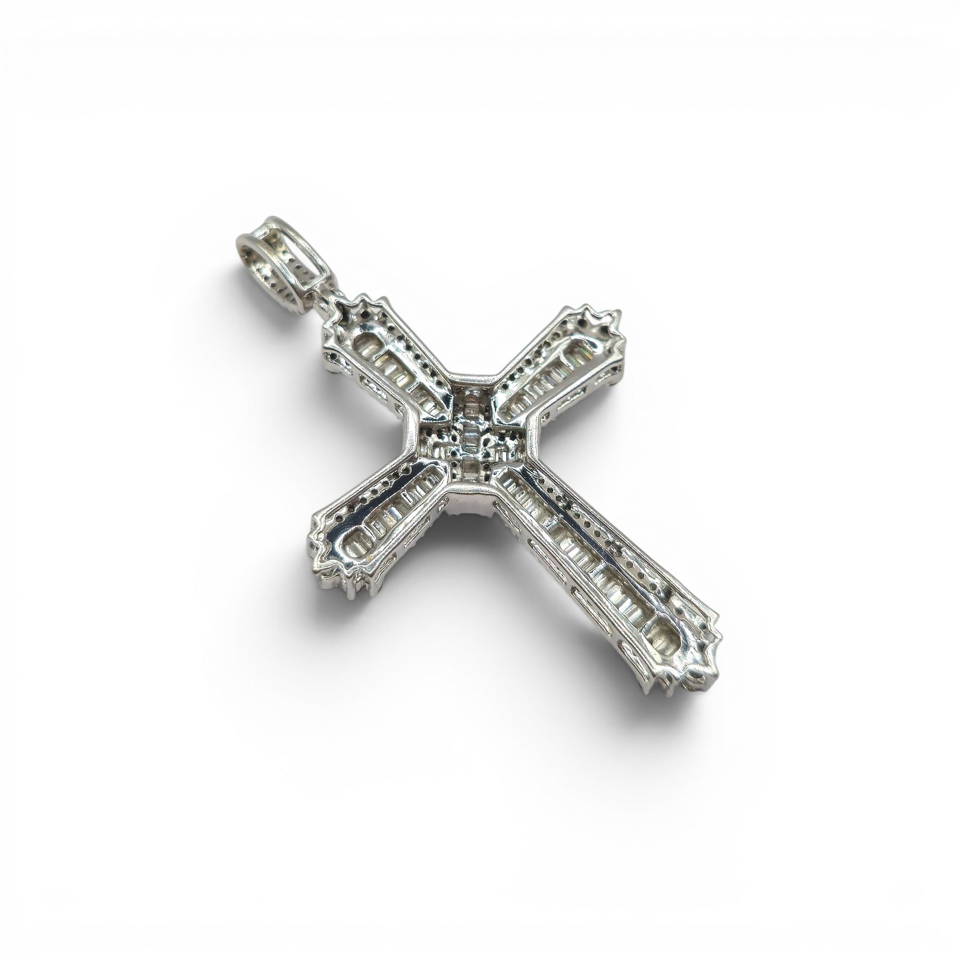 9ct white gold diamond cross pendant by Reeves and Sons, featuring a detailed cross design with sparkling diamonds.