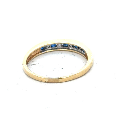 18ct yellow gold sapphire and diamond ring, size S, featuring a sparkling gemstone design with a lightweight 3.3g setting.