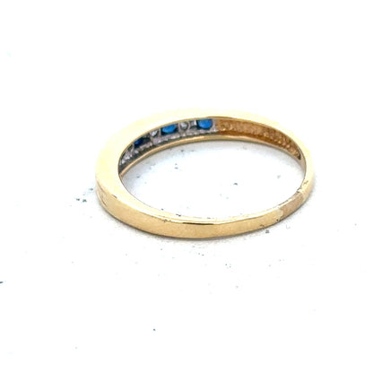 18ct yellow gold sapphire and diamond ring, size S, featuring a sparkling gemstone and elegant design.