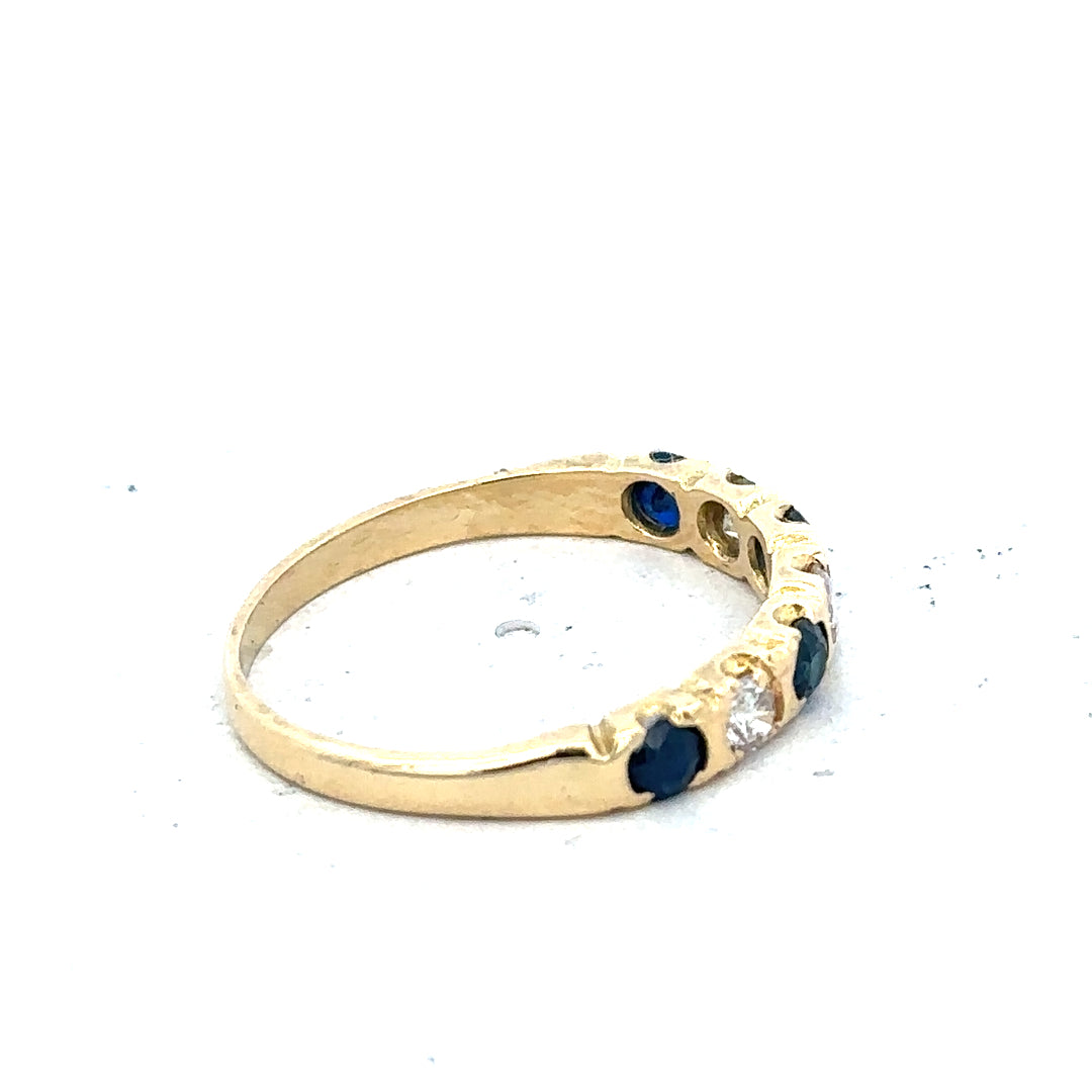 18ct yellow gold diamond and sapphire ring, size M 1/2, featuring sparkling gemstones and elegant craftsmanship.