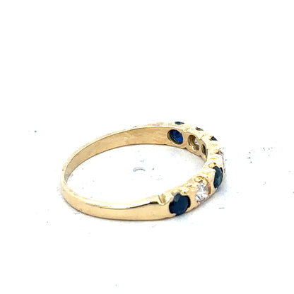 18ct yellow gold diamond and sapphire ring, size M 1/2, featuring sparkling gemstones and elegant craftsmanship.