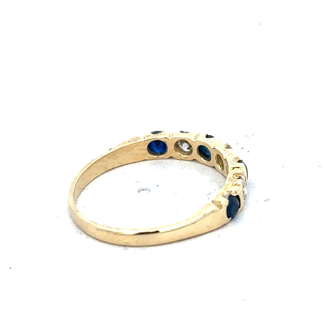 18ct yellow gold diamond and sapphire ring, size M 1/2, featuring a sparkling gemstone design and elegant craftsmanship.