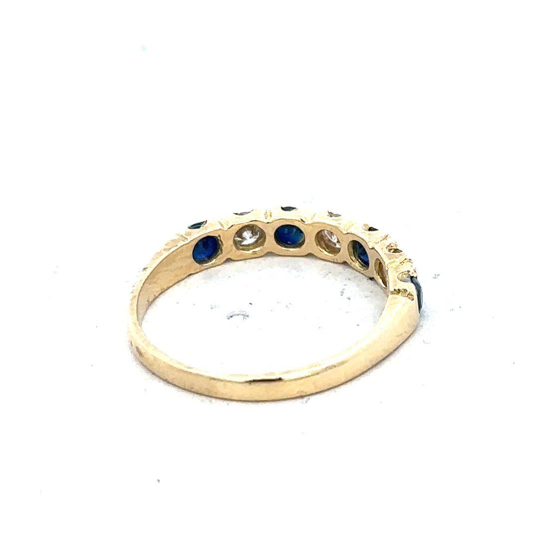 18ct yellow gold diamond and sapphire ring with size M 1/2, featuring sparkling gemstones and a classic design.