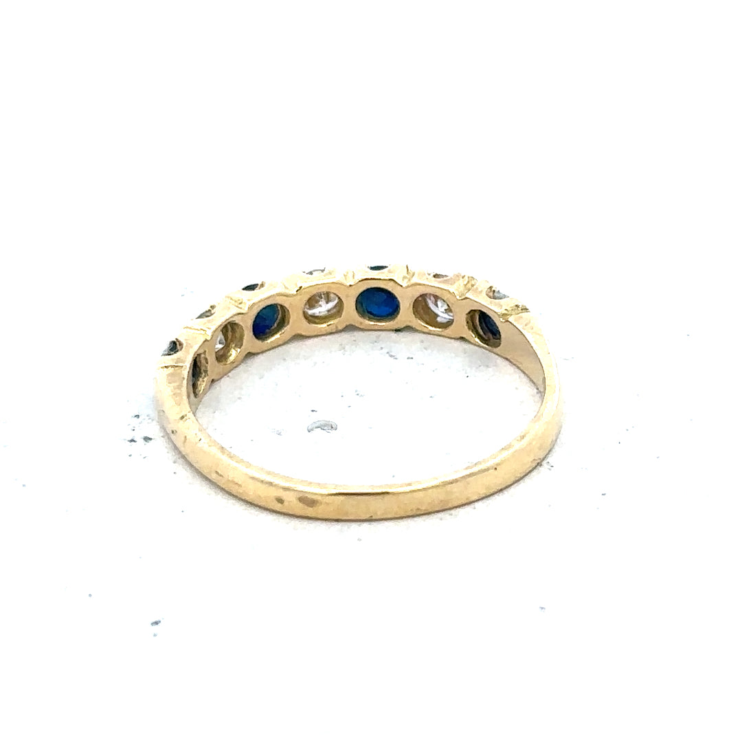 18ct yellow gold diamond and sapphire ring, size M 1/2, featuring sparkling gemstones and elegant craftsmanship.