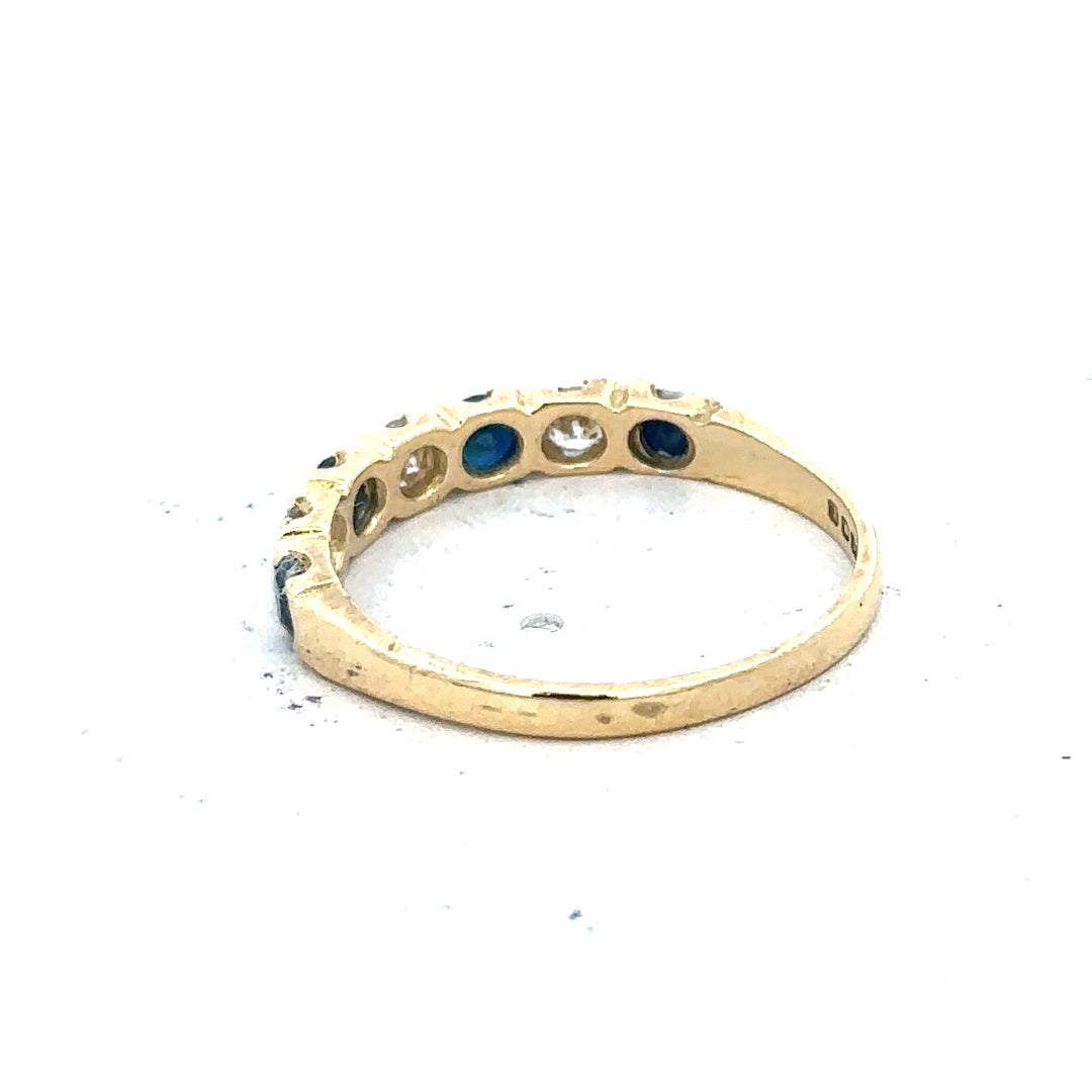 18ct yellow gold diamond and sapphire ring, size M 1/2, showcasing sparkling gemstones and elegant gold band.