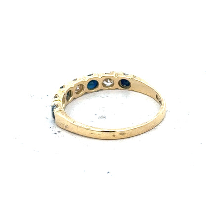 18ct yellow gold diamond and sapphire ring, size M 1/2, showcasing sparkling gemstones and elegant gold band.