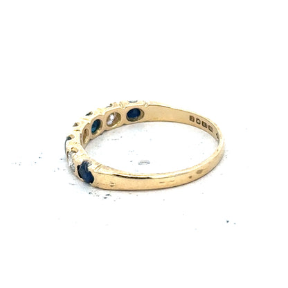 18ct yellow gold diamond and sapphire ring, size M 1/2, featuring sparkling gemstones and elegant gold band.