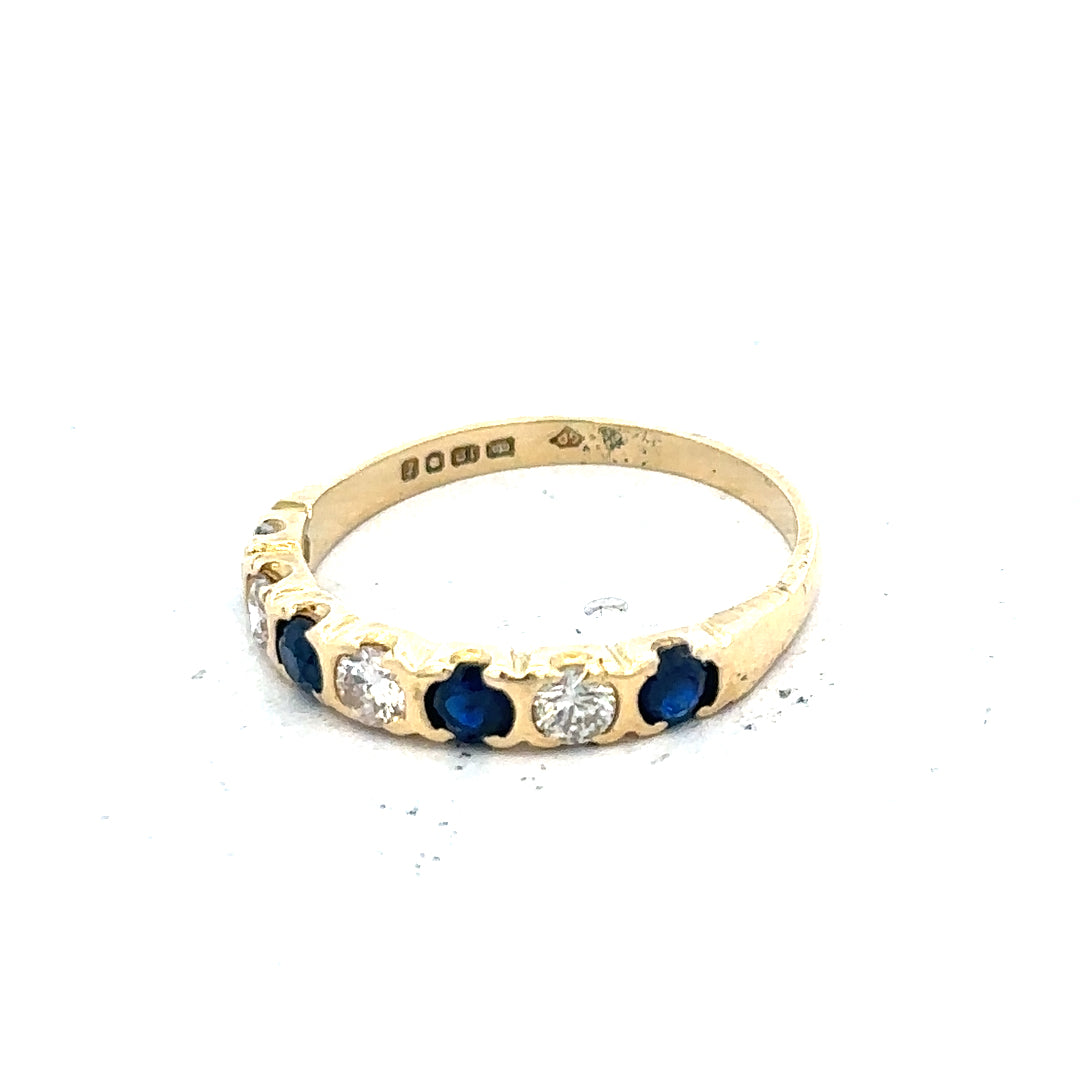 18ct yellow gold diamond and sapphire ring in size M 1/2, featuring a sparkling gemstone design and elegant craftsmanship.