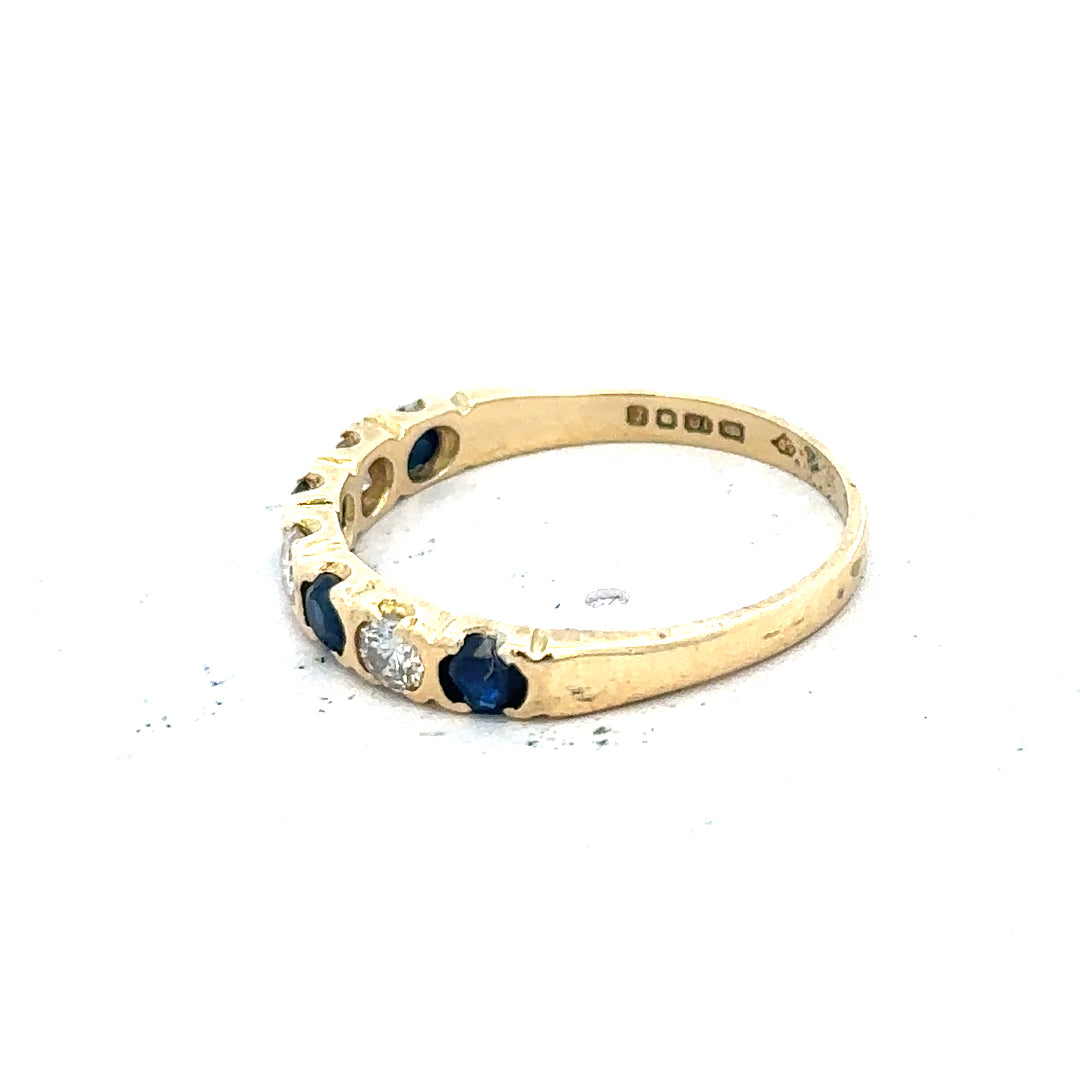 18ct yellow gold diamond and sapphire ring size M 1/2, unbranded, featuring a gold band with sparkling diamonds and blue sapphires.