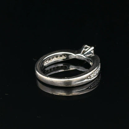 18ct white gold diamond ring with 1/3 carat round diamond, size J, featuring elegant design and sparkling gemstone.