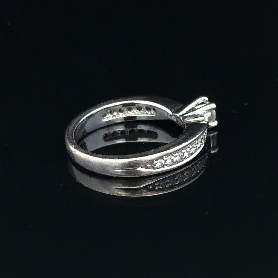 18ct white gold diamond ring with 1/3 carat total weight, size J, featuring a sparkling diamond setting.