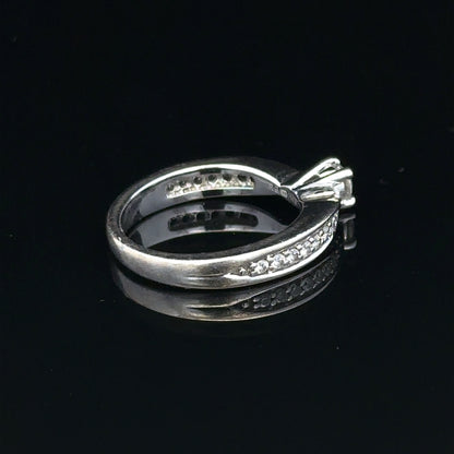 18ct white gold diamond ring with 1/3 carat total weight, size J, featuring a sparkling diamond setting.