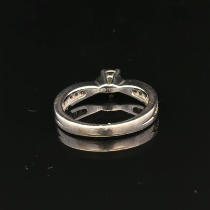 18ct white gold diamond ring with 1/3 carat total weight, size J, featuring a sparkling central diamond.