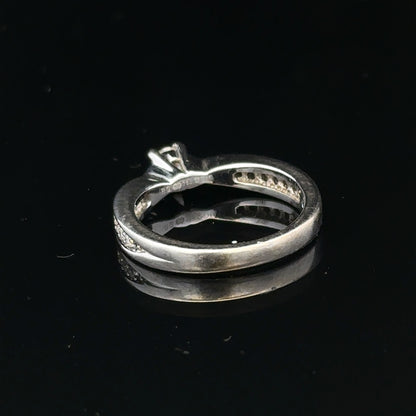 18ct white gold diamond ring with 1/3 carat total weight, size J, featuring a sparkling central diamond.
