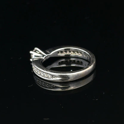 18ct white gold diamond ring with 1/3 carat solitaire in size J, featuring a sparkling central diamond and elegant band design.