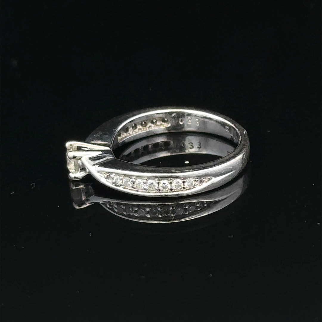 18ct white gold diamond ring with 1/3 carat round diamond, size J, elegant jewelry piece with sparkling gemstone.