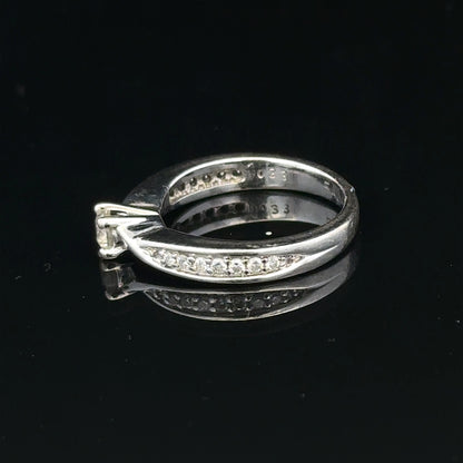 18ct white gold diamond ring with 1/3 carat round diamond, size J, elegant jewelry piece with sparkling gemstone.