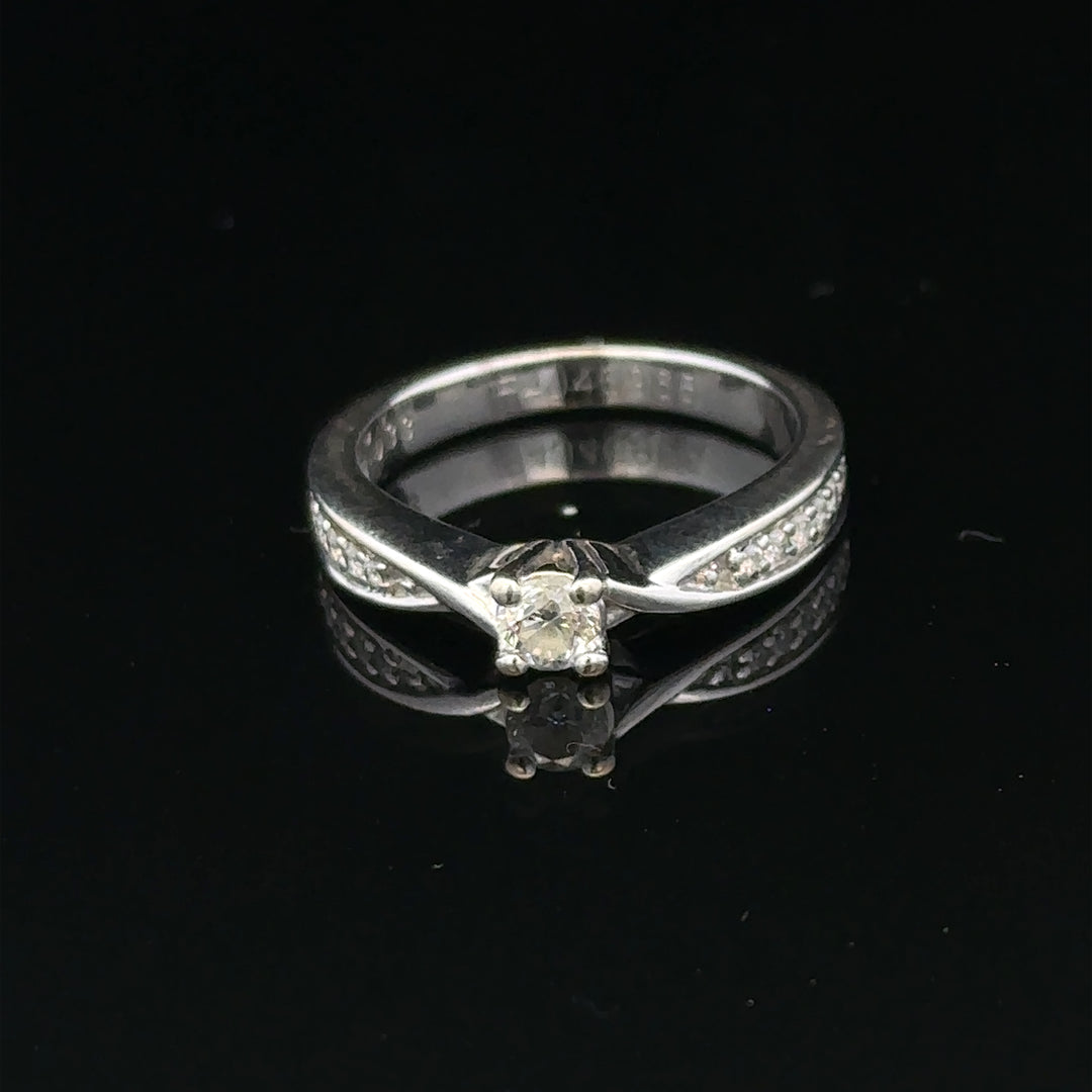 18ct white gold diamond ring with 1/3 carat total weight, size J, featuring sparkling diamonds and a sleek, elegant design.