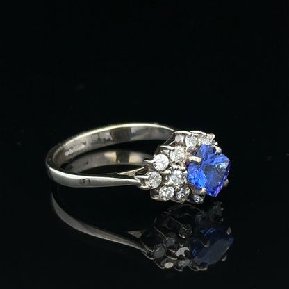 18ct white gold diamond and tanzanite ring in size O with sparkling gemstones and elegant design.