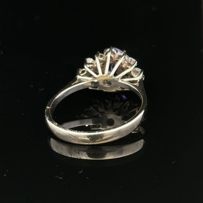 18ct white gold diamond and tanzanite ring size O, featuring sparkling gemstones and a sleek band design.