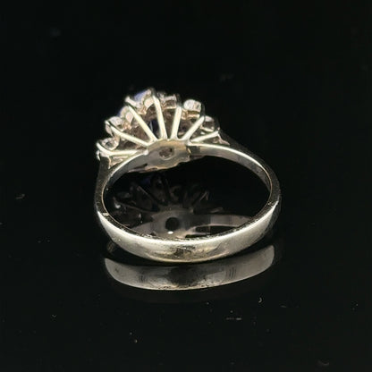18ct white gold diamond and tanzanite ring in size O, showcasing sparkling stones set in elegant jewelry design