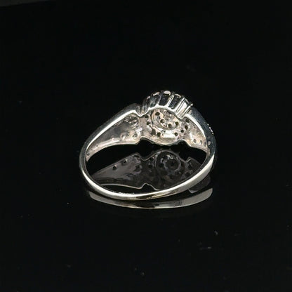9ct white gold diamond ring in size M, featuring sparkling diamonds and a sleek design, weighing 2.6 grams.