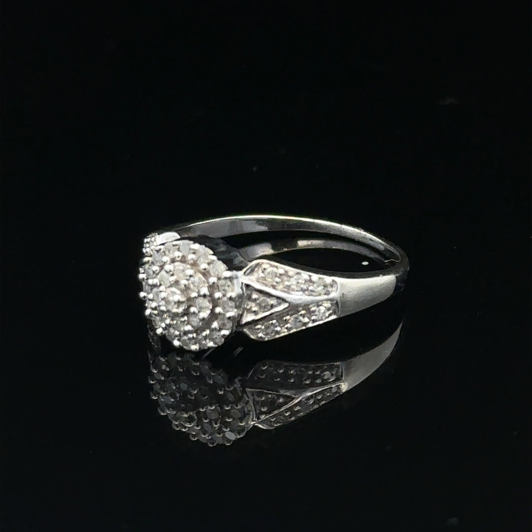 9ct white gold diamond ring, size M, featuring sparkling diamonds and a sleek design, weighs 2.6g.