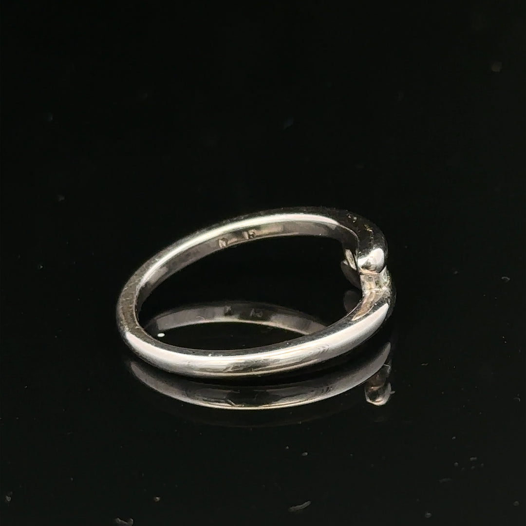 18ct white gold diamond ring, size M.5, featuring sparkling diamonds and elegant design, weighs 4.2g.