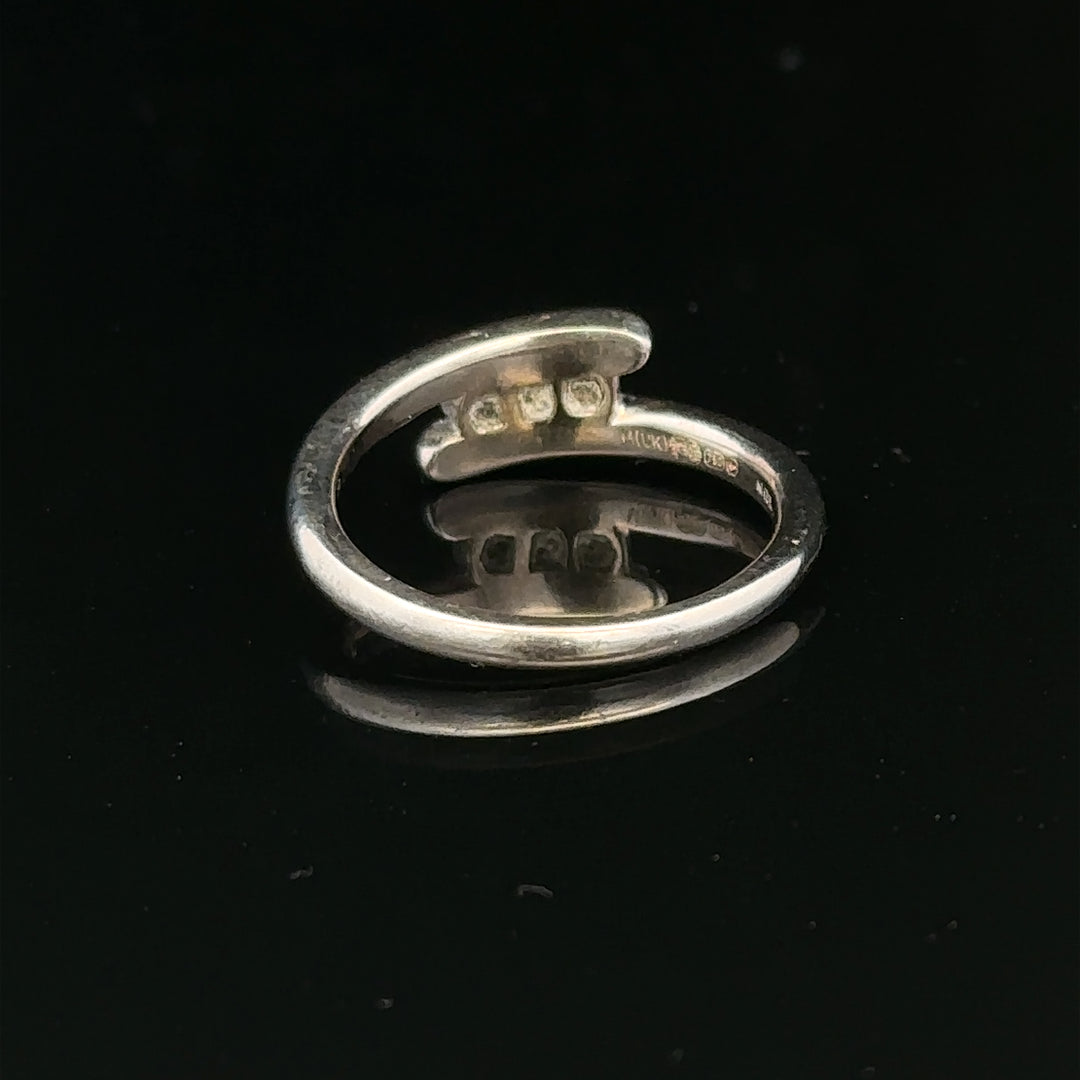 18ct white gold diamond ring in size M.5 with 4.2g weight, featuring sparkling diamonds and a sleek, elegant design.