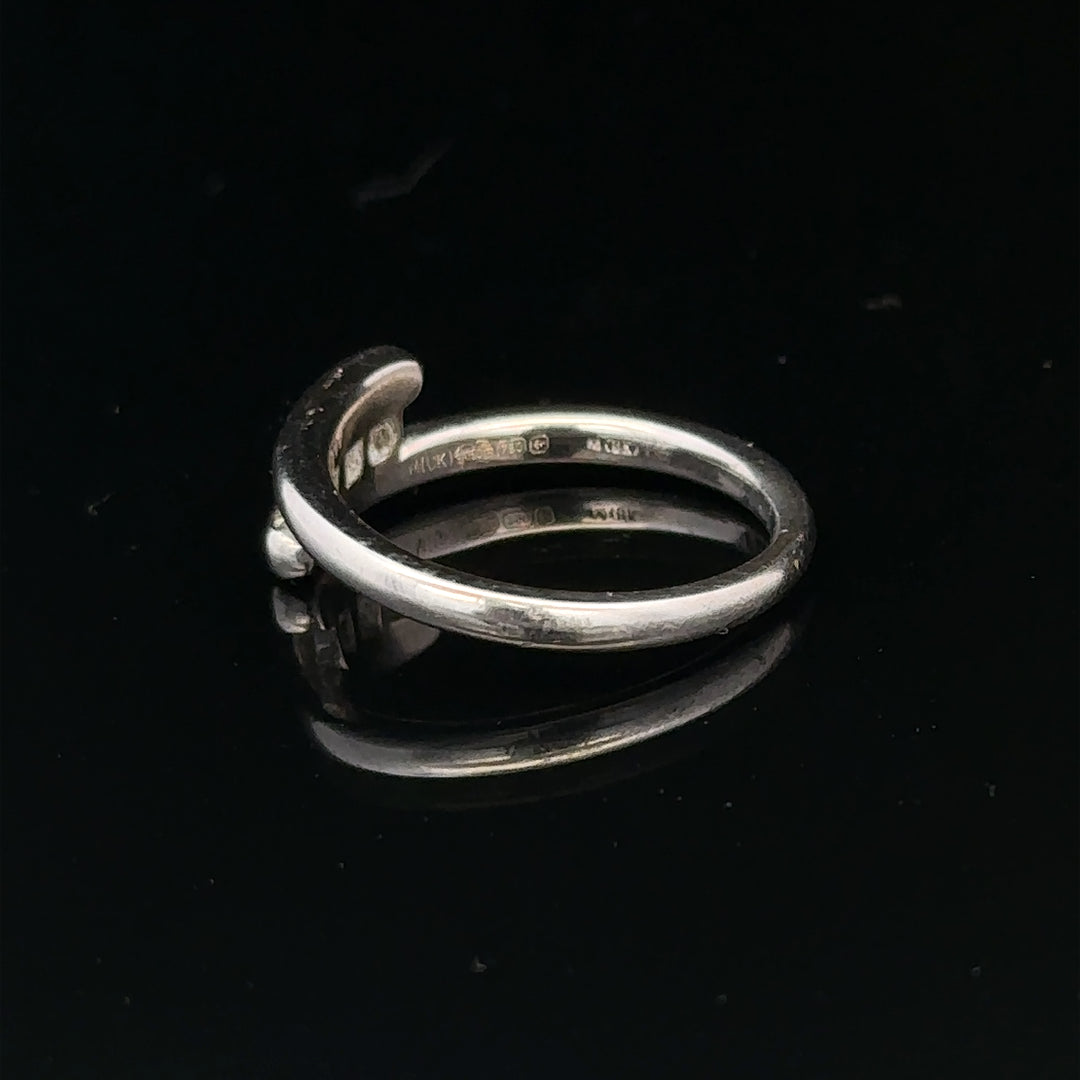 18ct white gold diamond ring in size M.5, featuring sparkling diamonds and a sleek design, weighs 4.2 grams.