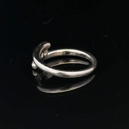 18ct white gold diamond ring in size M.5, featuring sparkling diamonds and a sleek design, weighs 4.2 grams.