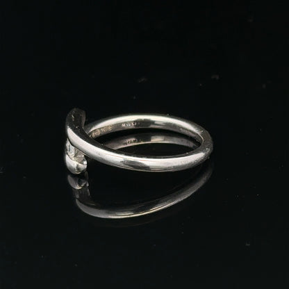 18ct white gold diamond ring, size M.5, weighing 4.2g, featuring sparkling diamonds on a sleek unbranded band.