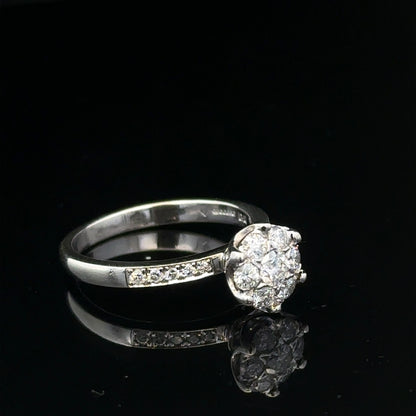9ct white gold diamond ring in size M with a polished band and sparkling diamond accents, weighs 3.2g.