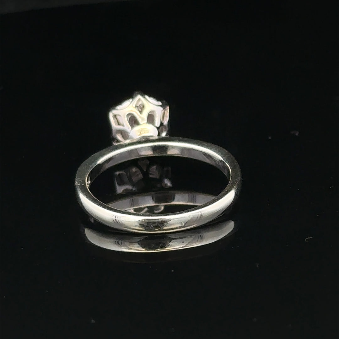 9ct white gold diamond ring, size M, showcasing a sparkling diamond setting, unbranded jewelry with elegant design.