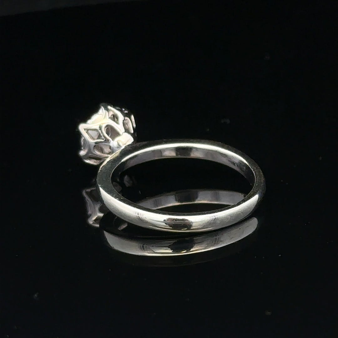 9ct white gold diamond ring in size M with 3.2g, featuring sparkling diamonds and a sleek, elegant design.