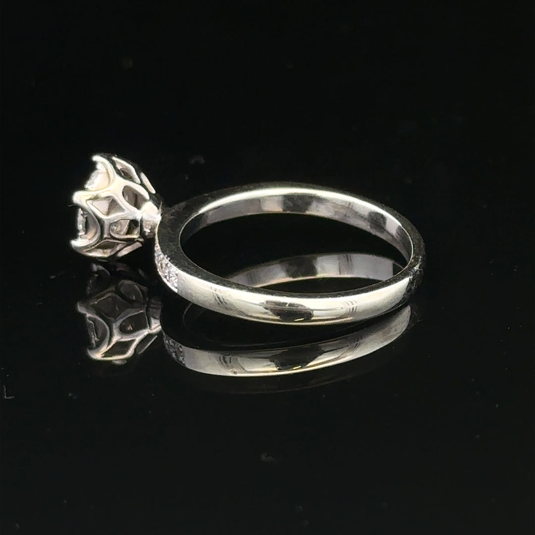 9ct white gold diamond ring with size M and 3.2g weight, featuring sparkling diamonds and a sleek, elegant design.