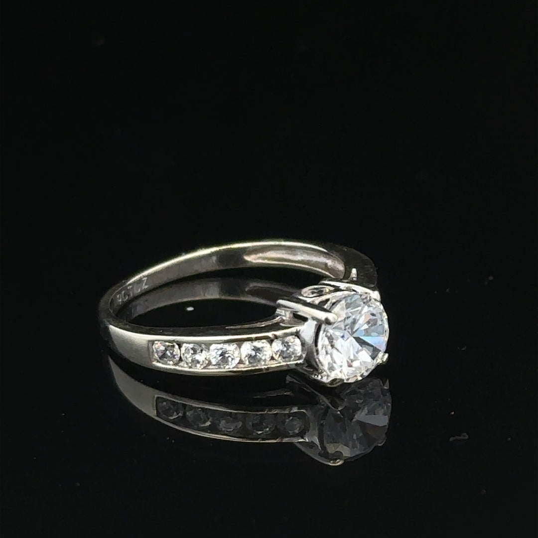 9ct white gold ring in size L 1/2, weighing 2g, showcasing a sleek, polished design with a smooth band.