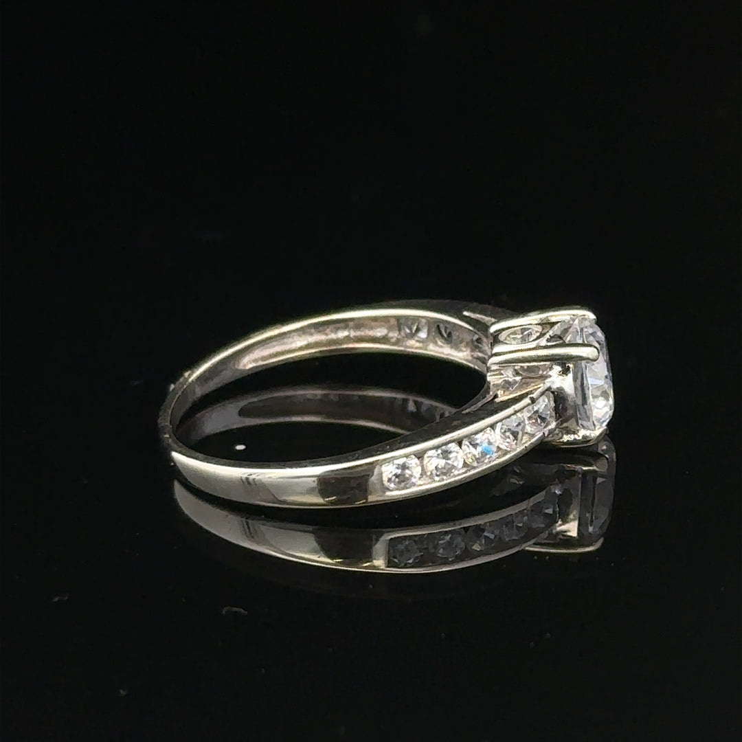 9ct white gold ring in size L 1/2 with a 2g weight, featuring a sleek, polished design and unbranded craftsmanship.