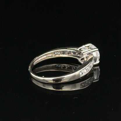 9ct white gold ring in size L 1/2, weighs 2g, featuring a sleek, polished band with a simple, elegant design.