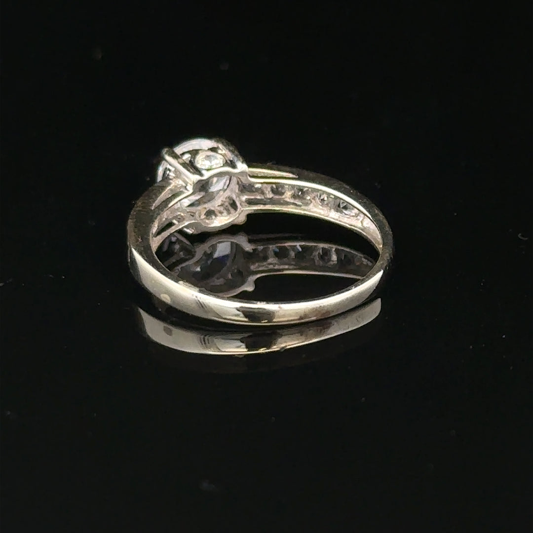 9ct white gold ring in size L 1/2, weighing 2g, featuring a sleek, polished design with a smooth band.