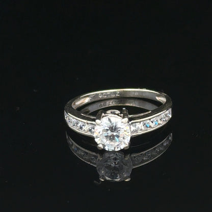 9ct white gold ring in size L 1/2, weighing 2g, featuring a sleek, polished finish. Unbranded jewelry ring displayed.